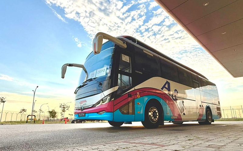A&S Transit long-distance charter bus parked outdoors.